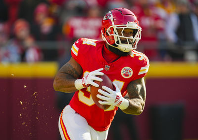 Nov 29, 2024; Kansas City, Missouri, USA; Kansas City Chiefs running back Samaje Perine (34) returns a kickoff during the first half against the Las Vegas Raiders at GEHA Field at Arrowhead Stadium. Mandatory Credit: Jay Biggerstaff-Imagn Images