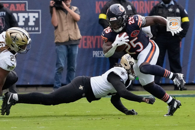 Oct 19, 2025; Chicago, Illinois, USA; Chicago Bears running back Kyle Monangai (25) runs the ball against the New Orleans Saints during the second half at Soldier Field. Credit: David Banks-Imagn Images