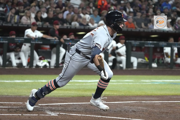 Mar 31, 2026; Phoenix, Arizona, USA; Detroit Tigers shortstop Kevin McGonigle (7) hits a single against the Arizona Diamondbacks in the third inning at Chase Field. Credit: Rick Scuteri-Imagn Images
