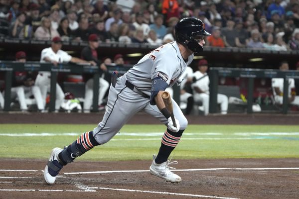 Mar 31, 2026; Phoenix, Arizona, USA; Detroit Tigers shortstop Kevin McGonigle (7) hits a single against the Arizona Diamondbacks in the third inning at Chase Field. Mandatory Credit: Rick Scuteri-Imagn Images