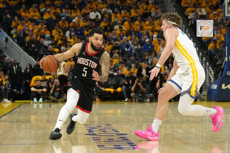 Apr 26, 2025; San Francisco, California, USA; Houston Rockets guard Fred VanVleet (5) dribbles against Golden State Warriors guard Brandin Podziemski (right) during the third quarter of game three of first round for the 2024 NBA Playoffs at Chase Center. Credit: Darren Yamashita-Imagn Images