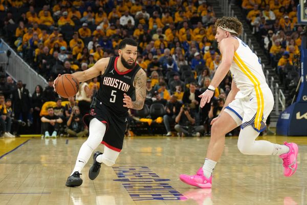Apr 26, 2025; San Francisco, California, USA; Houston Rockets guard Fred VanVleet (5) dribbles against Golden State Warriors guard Brandin Podziemski (right) during the third quarter of game three of first round for the 2024 NBA Playoffs at Chase Center. Mandatory Credit: Darren Yamashita-Imagn Images