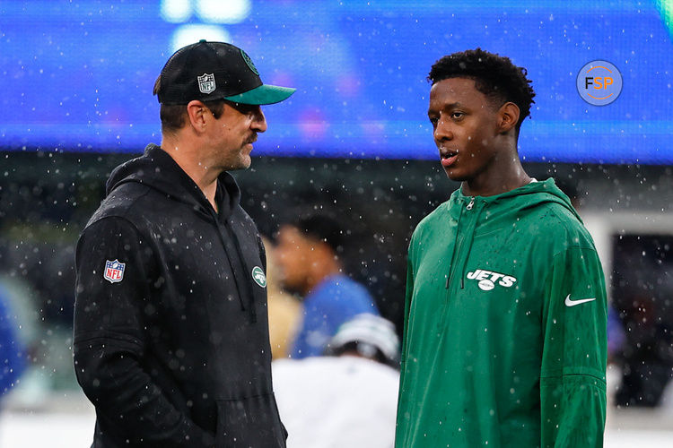EAST RUTHERFORD, NJ - OCTOBER 29:  Aaron Rodgers (8) of the New York Jets talks with Sauce Gardner (1)  prior to the game against the New York Giants on October 29, 2023 at MetLife Stadium in East Rutherford, New Jersey.  (Photo by Rich Graessle/Icon Sportswire)