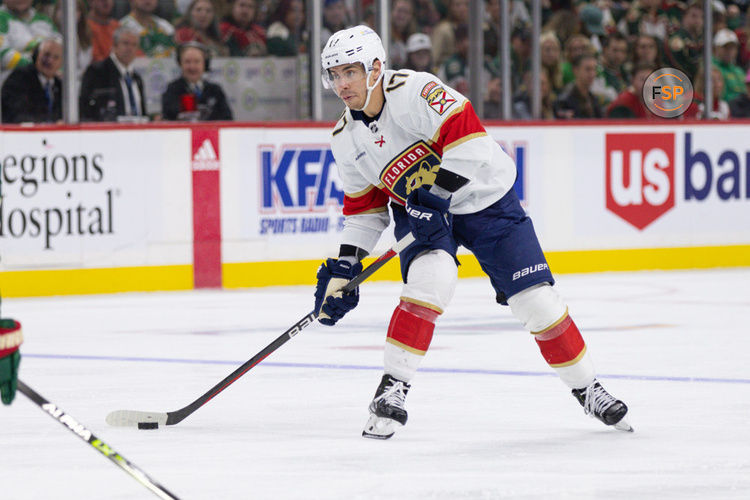 MINNEAPOLIS, MN - OCTOBER 12: Florida Panthers center Evan Rodrigues (17) looks to shoot the puck during the NHL game between the Florida Panthers and Minnesota Wild on October 12, 2023, at Xcel Energy Center in Saint Paul, MN. (Photo by Bailey Hillesheim/Icon Sportswire)