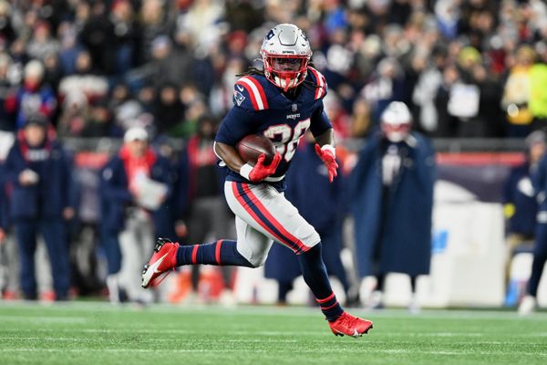 Jan 4, 2026; Foxborough, Massachusetts, USA; New England Patriots running back Rhamondre Stevenson (38) runs the ball against the Miami Dolphins during the fourth quarter at Gillette Stadium. Mandatory Credit: Brian Fluharty-Imagn Images