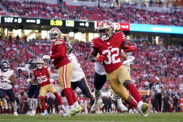 Dec 8, 2024; Santa Clara, California, USA; San Francisco 49ers running back Patrick Taylor Jr. (32) runs the ball against the Chicago Bears in the fourth quarter at Levi's Stadium. Mandatory Credit: Cary Edmondson-Imagn Images