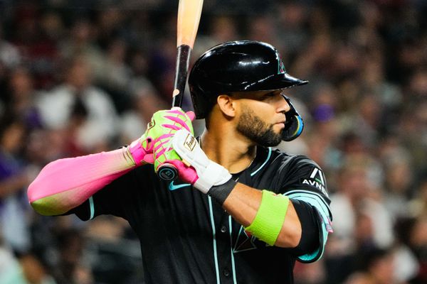 Aug 9, 2025; Phoenix, Arizona, USA; Arizona Diamondbacks outfielder Lourdes Gurriel Jr. (12) at bat in the seventh inning of the game between the Arizona Diamondbacks and Colorado Rockies at Chase Field. Mandatory Credit: Arianna Grainey-Imagn Images