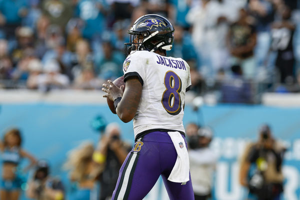 JACKSONVILLE, FL - NOVEMBER 27: Baltimore Ravens quarterback Lamar Jackson (8) throws a pass during the game between the Baltimore Ravens and the Jacksonville Jaguars on November 27, 2022 at TIAA Bank Field in Jacksonville, Fl.  (Photo by David Rosenblum/Icon Sportswire)