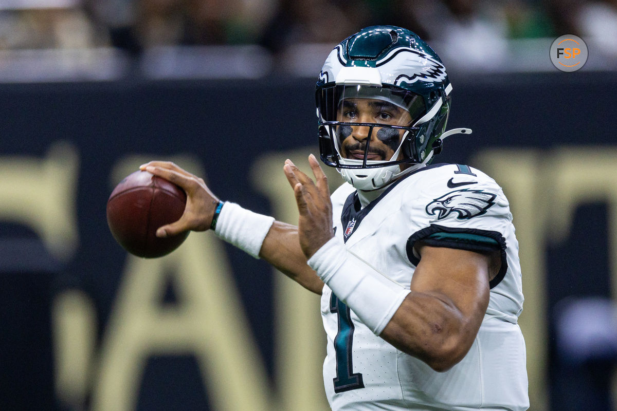 Sep 22, 2024; New Orleans, Louisiana, USA; Philadelphia Eagles quarterback Jalen Hurts (1) passes against the New Orleans Saints during the first half at Caesars Superdome. Credit: Stephen Lew-Imagn Images