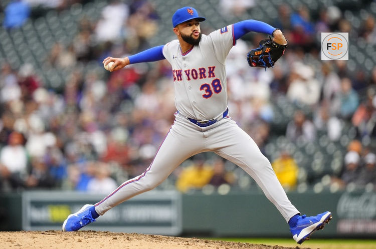 May 4, 2026; Denver, Colorado, USA; New York Mets relief pitcher Devin Williams (38) delivers a pitch in the ninth inning against the Colorado Rockies at Coors Field. Credit: Ron Chenoy-Imagn Images