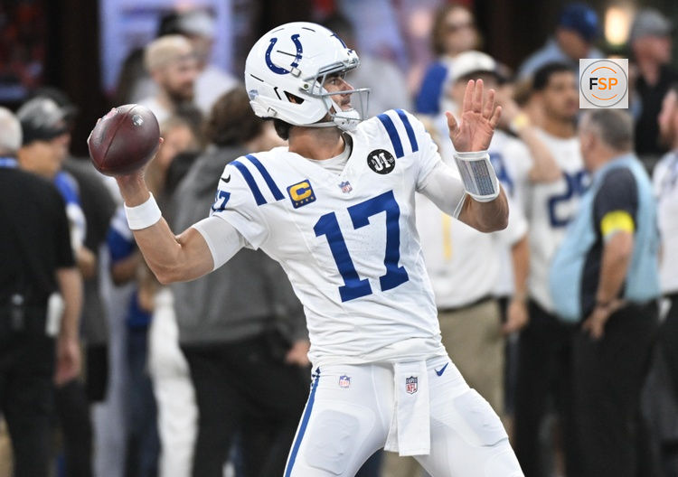 Sep 14, 2025; Indianapolis, Indiana, USA; Indianapolis Colts quarterback Daniel Jones (17) warms up prior to the game against the Denver Broncos at Lucas Oil Stadium. Credit: Robert Goddin-Imagn Images