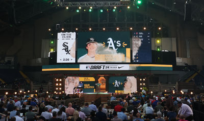 Jul 14, 2024; Ft. Worth, TX, USA; The Oakland Athletics draft  Nick Kurtz as the fourth pick during the first round of the MLB Draft at Cowtown Coliseum. Mandatory Credit: Kevin Jairaj-USA TODAY Sports
