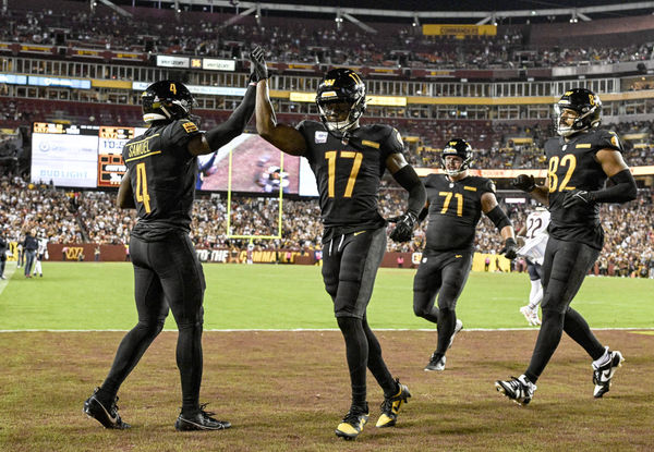 LANDOVER, MD - OCTOBER 05: Washington Commanders wide receiver Curtis Samuel (4) is congratulated by wide receiver Terry McLaurin (17) after catching touchdown pass during the NFL game between the Chicago Bears and the Washington Commanders on October 5, 2023 at Fed Ex Field in Landover, MD. (Photo by Mark Goldman/Icon Sportswire)