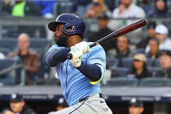 BRONX, NY - APRIL 19:  Randy Arozarena #56 of the Tampa Bay Rays hits a single during the first inning of  the Major League Baseball game against the New York Yankees on April 19, 2024 at Yankee Stadium in the Bronx, New York.  (Photo by Rich Graessle/Icon Sportswire)