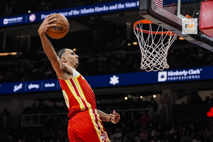 Nov 8, 2025; Atlanta, Georgia, USA; Atlanta Hawks forward Zaccharie Risacher (10) goes in for a dunk against the Los Angeles Lakers during the second half at State Farm Arena. Credit: Dale Zanine-Imagn Images