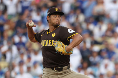 Oct 11, 2024; Los Angeles, California, USA; San Diego Padres pitcher Yu Darvish (11) pitches against the Los Angeles Dodgers in the first inning during game five of the NLDS for the 2024 MLB Playoffs at Dodger Stadium. Mandatory Credit: Kiyoshi Mio-Imagn Images