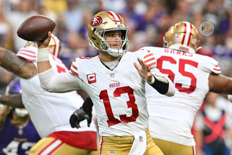 Sep 15, 2024; Minneapolis, Minnesota, USA; San Francisco 49ers quarterback Brock Purdy (13) throws a pass against the Minnesota Vikings during the first quarter U.S. Bank Stadium. Credit: Jeffrey Becker-Imagn Images