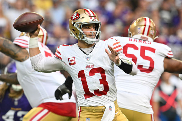 Sep 15, 2024; Minneapolis, Minnesota, USA; San Francisco 49ers quarterback Brock Purdy (13) throws a pass against the Minnesota Vikings during the first quarter U.S. Bank Stadium. Mandatory Credit: Jeffrey Becker-Imagn Images