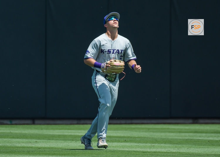 May 13, 2023; Stillwater, OK, USA;  Kansas State Wildcats outfielder Brendan Jones (5) waits on a fly ball against the Oklahoma State Cowboys. Credit: Brett Rojo-USA TODAY Sports
