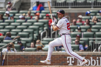 Apr 23, 2025; Cumberland, Georgia, USA; Atlanta Braves first base Matt Olson (28) singles against the St. Louis Cardinals during the eighth inning at Truist Park. Mandatory Credit: Dale Zanine-Imagn Images
