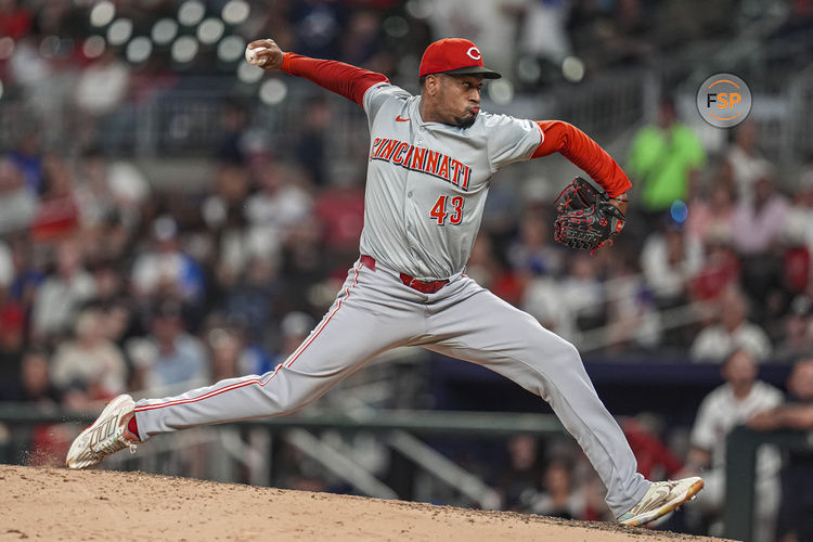 Sep 9, 2024; Cumberland, Georgia, USA; Cincinnati Reds relief pitcher Alexis Diaz (43) pitches against the Atlanta Braves during the ninth inning at Truist Park. Credit: Dale Zanine-Imagn Images