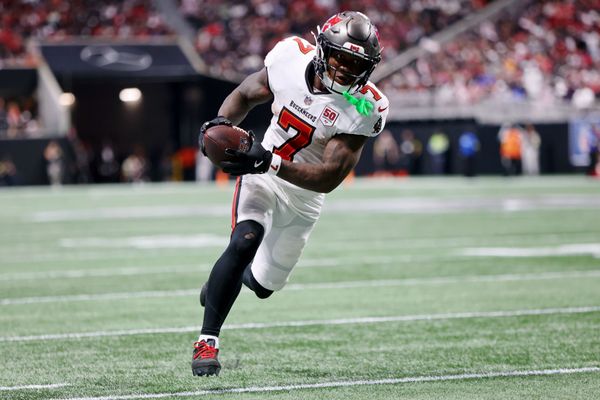 Sep 7, 2025; Atlanta, Georgia, USA; Tampa Bay Buccaneers running back Bucky Irving (7) runs with the ball for a touchdown against the Atlanta Falcons during the third quarter at Mercedes-Benz Stadium. Mandatory Credit: Brett Davis-Imagn Images