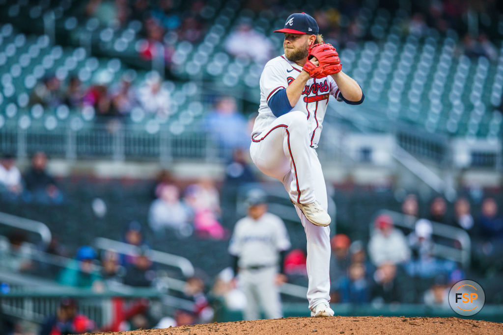 ATLANTA, GA - APRIL 27: A.J. Minter #33 of the Atlanta Braves pitches during the ninth inning during the game between the Atlanta Braves the Miami Marlins at Truist Park on April 27, 2023 in Atlanta, Georgia. (Photo by Matthew Grimes Jr./Atlanta Braves/Getty Images)
