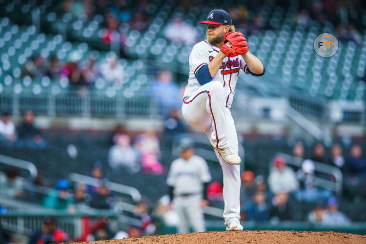 ATLANTA, GA - APRIL 27: A.J. Minter #33 of the Atlanta Braves pitches during the ninth inning during the game between the Atlanta Braves the Miami Marlins at Truist Park on April 27, 2023 in Atlanta, Georgia. (Photo by Matthew Grimes Jr./Atlanta Braves/Getty Images)