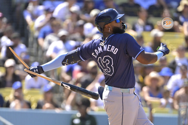 Aug 25, 2024; Los Angeles, California, USA;  Tampa Bay Rays third baseman Junior Caminero (13) breaks his bat on a ground out in the eighth inning against the Los Angeles Dodgers at Dodger Stadium. Credit: Jayne Kamin-Oncea-USA TODAY Sports