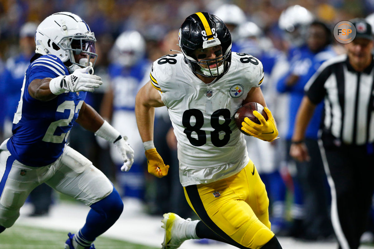 INDIANAPOLIS, IN - NOVEMBER 28: Pittsburgh Steelers tight end Pat Freiermuth (88) heads up field chased by Indianapolis Colts cornerback Kenny Moore II (23) during an NFL game between the Pittsburg Steelers and the Indianapolis Colts on November 28, 2022 at Lucas Oil Stadium in Indianapolis, IN.  (Photo by Jeffrey Brown/Icon Sportswire)