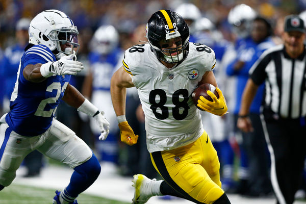 INDIANAPOLIS, IN - NOVEMBER 28: Pittsburgh Steelers tight end Pat Freiermuth (88) heads up field chased by Indianapolis Colts cornerback Kenny Moore II (23) during an NFL game between the Pittsburg Steelers and the Indianapolis Colts on November 28, 2022 at Lucas Oil Stadium in Indianapolis, IN.  (Photo by Jeffrey Brown/Icon Sportswire)