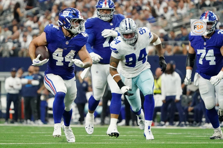 Sep 14, 2025; Arlington, Texas, USA; New York Giants running back Cam Skattebo (44) runs with the ball against the Dallas Cowboys during the fourth quarter at AT&T Stadium. Credit: Raymond Carlin III-Imagn Images