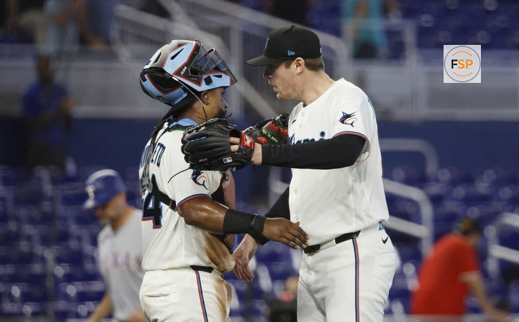 Jun 24, 2026; Miami, Florida, USA;  Miami Marlins catcher Brian Navarreto (64) and relief pitcher Pete Fairbanks (29) celebrate the win against the Texas Rangers following the game at loanDepot Park. Credit: Rhona Wise-Imagn Images