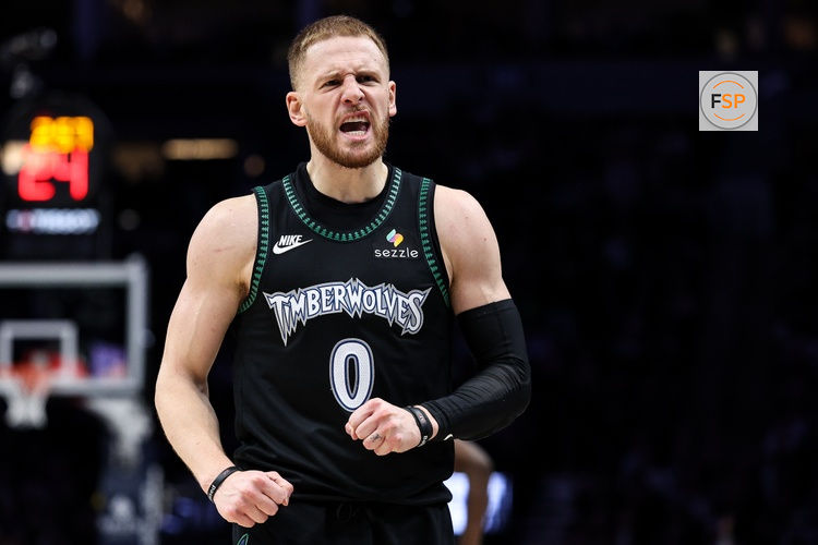 Nov 30, 2025; Minneapolis, Minnesota, USA; Minnesota Timberwolves guard Donte DiVincenzo (0) celebrates his three point basket against the San Antonio Spurs during the second half at Target Center. Credit: Matt Krohn-Imagn Images