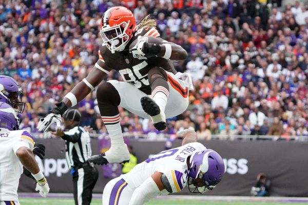 Oct 5, 2025; Tottenham, United Kingdom; Cleveland Browns tight end David Njoku (85) leaps over Minnesota Vikings linebacker Ivan Pace Jr. (0) during the third quarter of an NFL International Series game at Tottenham Hotspur Stadium. Mandatory Credit: Kirby Lee-Imagn Images