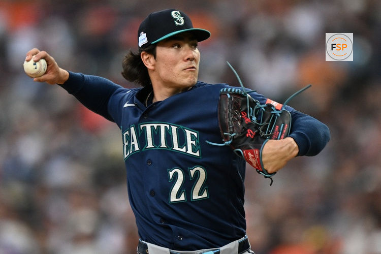 Jun 5, 2026; Detroit, Michigan, USA;  Seattle Mariners starting pitcher Bryan Woo (22) throws a pitch against the Detroit Tigers in the third inning at Comerica Park. Credit: Lon Horwedel-Imagn Images