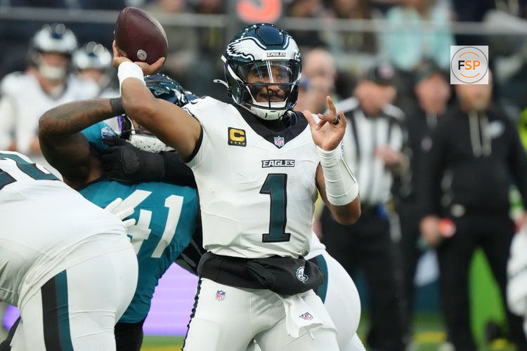 Oct 11, 2026; Tottenham, ENG;  Philadelphia Eagles quarterback Jalen Hurts (1) throws a pass during the second half against the Jacksonville Jaguars at Tottenham Hotspur Stadium.  Credit: Kirby Lee-Imagn Images
