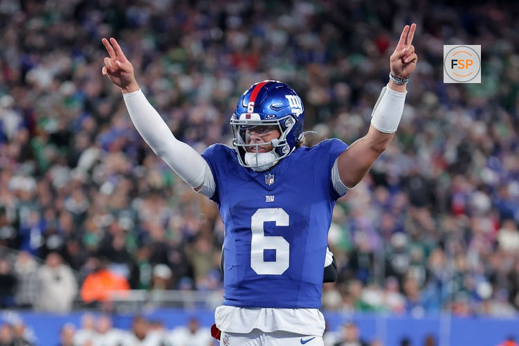Oct 9, 2025; East Rutherford, New Jersey, USA; New York Giants quarterback Jaxson Dart (6) celebrates after a touchdown against the Philadelphia Eagles during the fourth quarter of the game at MetLife Stadium. Credit: Brad Penner-Imagn Images