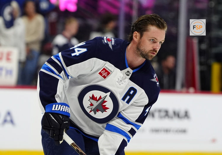 Sep 25, 2026; Denver, Colorado, USA;  Winnipeg Jets defenseman Josh Morrissey (44) skates before the game against the Colorado Avalanche at Ball Arena.  Credit: Ron Chenoy-Imagn Images