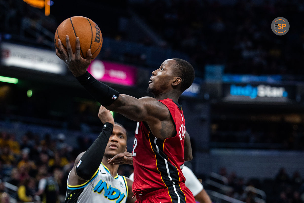 Nov 17, 2024; Indianapolis, Indiana, USA; Miami Heat guard Terry Rozier (2) shoots the ball while Indiana Pacers guard Bennedict Mathurin (00) defends in the second half at Gainbridge Fieldhouse. Credit: Trevor Ruszkowski-Imagn Images