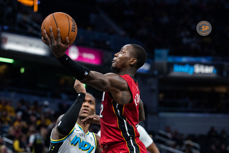 Nov 17, 2024; Indianapolis, Indiana, USA; Miami Heat guard Terry Rozier (2) shoots the ball while Indiana Pacers guard Bennedict Mathurin (00) defends in the second half at Gainbridge Fieldhouse. Credit: Trevor Ruszkowski-Imagn Images