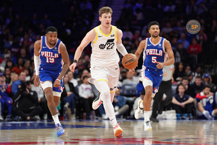 Mar 9, 2025; Philadelphia, Pennsylvania, USA; Utah Jazz center Kyle Filipowski (22) drives with the ball against the Philadelphia 76ers in the fourth quarter at Wells Fargo Center. Credit: Kyle Ross-Imagn Images