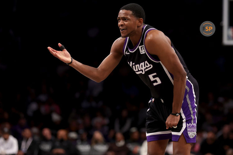 Jan 27, 2025; Brooklyn, New York, USA; Sacramento Kings guard De'Aaron Fox (5) reacts during the second quarter against the Brooklyn Nets at Barclays Center. Credit: Brad Penner-Imagn Images