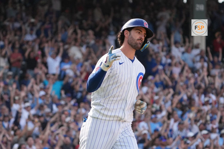 Apr 23, 2026; Chicago, Illinois, USA; Chicago Cubs shortstop Dansby Swanson (7) hits a walk-off single against the Philadelphia Phillies during the tenth inning at Wrigley Field. Credit: David Banks-Imagn Images