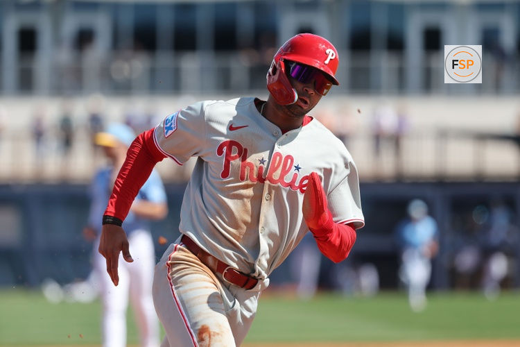 Feb 25, 2025; Port Charlotte, Florida, USA;  Philadelphia Phillies outfielder Justin Crawford (80) runs home to score against the Tampa Bay Rays during the fourth inning at Charlotte Sports Park. Credit: Kim Klement Neitzel-Imagn Images