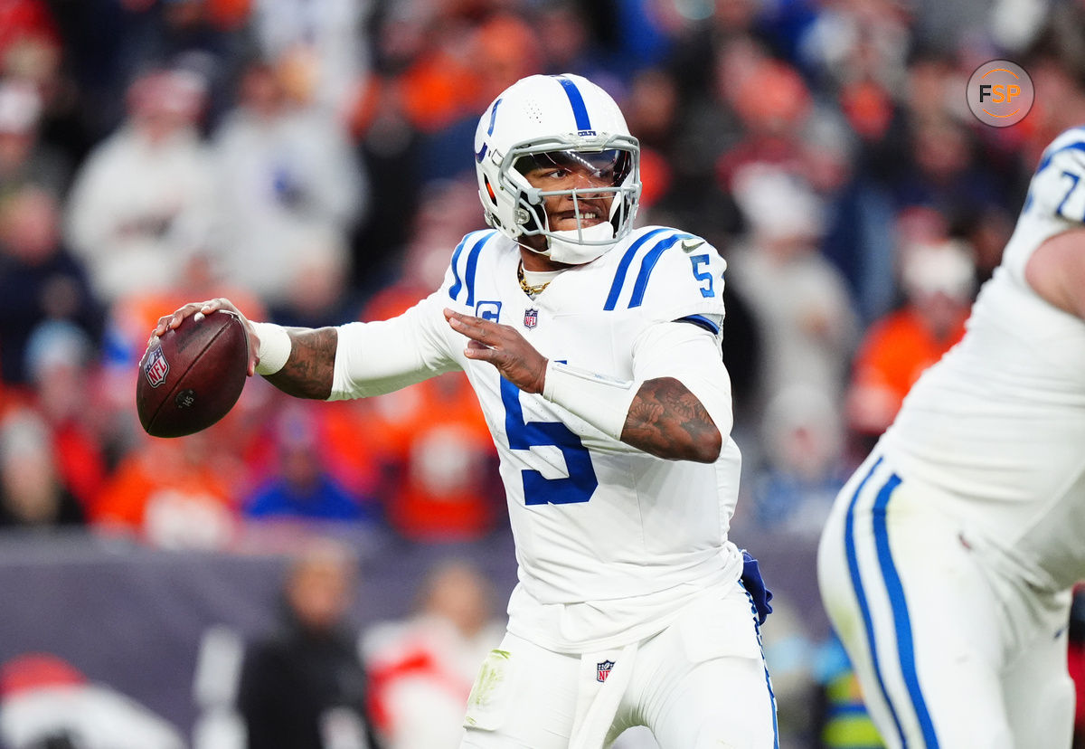 Dec 15, 2024; Denver, Colorado, USA; Indianapolis Colts quarterback Anthony Richardson (5) prepares to pass the ball in the second half against the Denver Broncos at Empower Field at Mile High. Credit: Ron Chenoy-Imagn Images