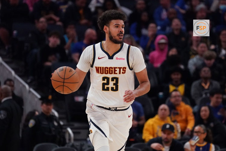 Feb 22, 2026; San Francisco, California, USA;  Denver Nuggets forward Cameron Johnson (23) dribbles upcourt against the Golden State Warriors in the third quarter at Chase Center. Credit: David Gonzales-Imagn Images
