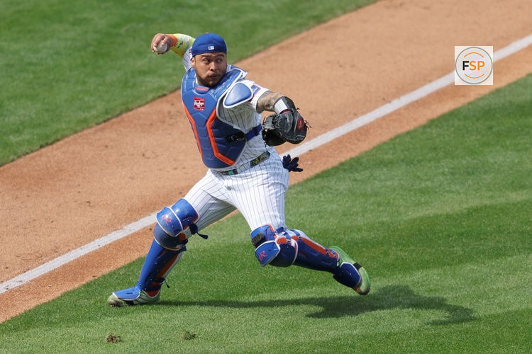 Mar 26, 2026; New York City, New York, USA; New York Mets catcher Francisco Alvarez (4) throws out Pittsburgh Pirates third baseman Nick Gonzales (not pictured) on an infield ground ball during the second inning at Citi Field. Credit: Brad Penner-Imagn Images