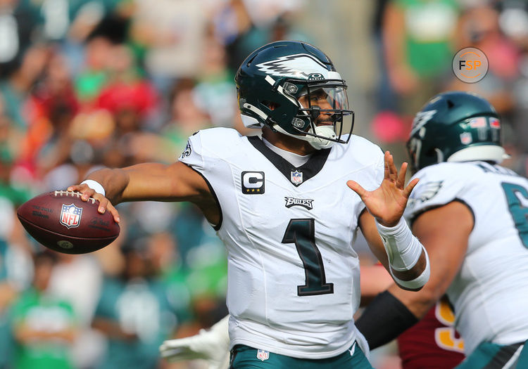 LANDOVER, MD - OCTOBER 29: Philadelphia Eagles quarterback Jalen Hurts (1) throws a pass from the pocket during the Philadelphia Eagles game versus the Washington Commanders on October 29, 2023, at FedEx Field in Landover, MD. (Photo by Lee Coleman/Icon Sportswire)