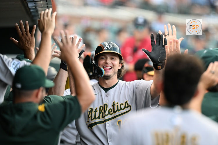 Jun 25, 2025; Detroit, Michigan, USA; Athletics first baseman Nick Kurtz (16) celebrates in the dugout after hitting a three-run home run against the Detroit Tigers in the third inning at Comerica Park. Credit: Lon Horwedel-Imagn Images